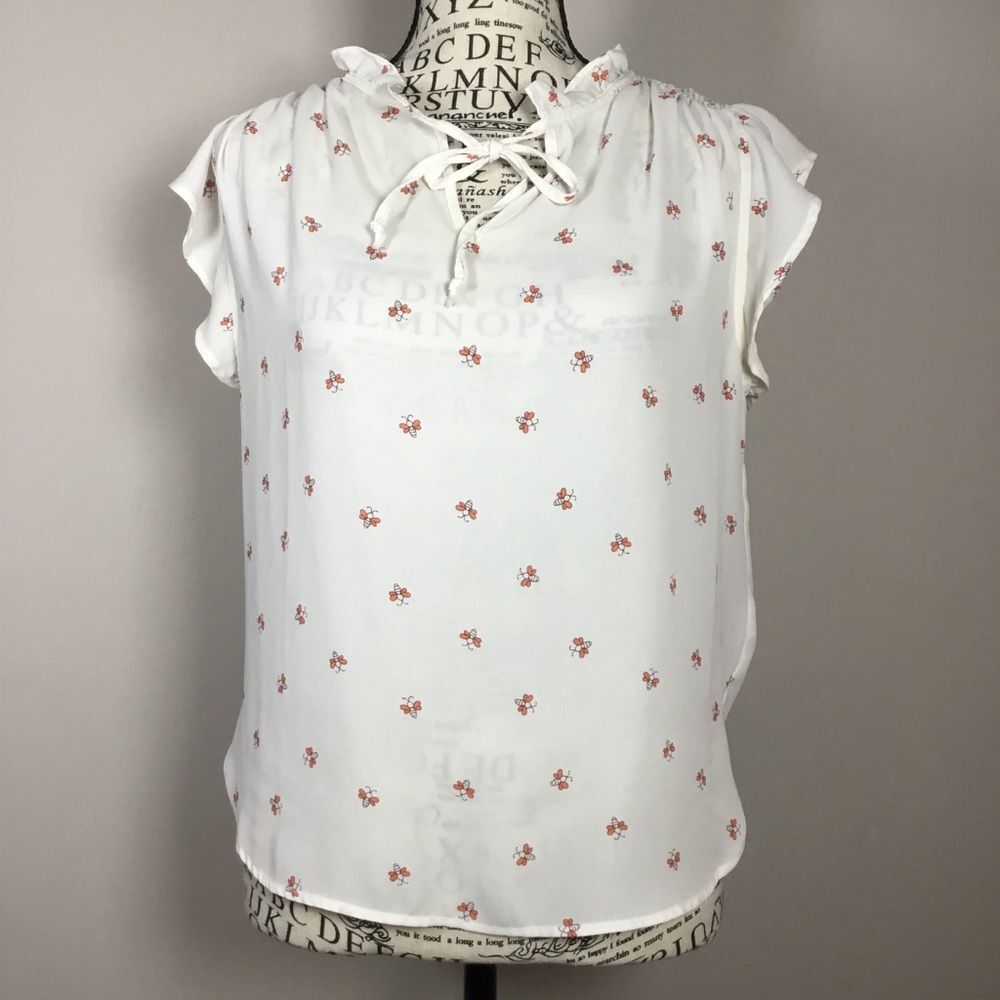 Creamy white ruffle short sleeve blouse black & orange bee pattern keyhole tie S